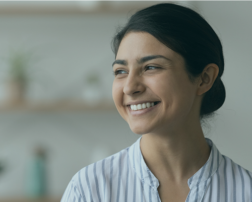 Person smiling — grounded state after regulation and rest